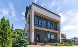 Фото 1: Коттедж 339 м² на участке 6.2 сот. - Рост Недвижимость