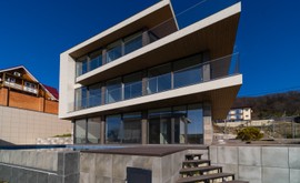 Фото 1: Коттедж 300 м² на участке 6.5 сот. - Рост Недвижимость