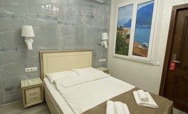 Фото 1: 1 комн. квартира, 10 м², 3/1 эт. - Рост Недвижимость